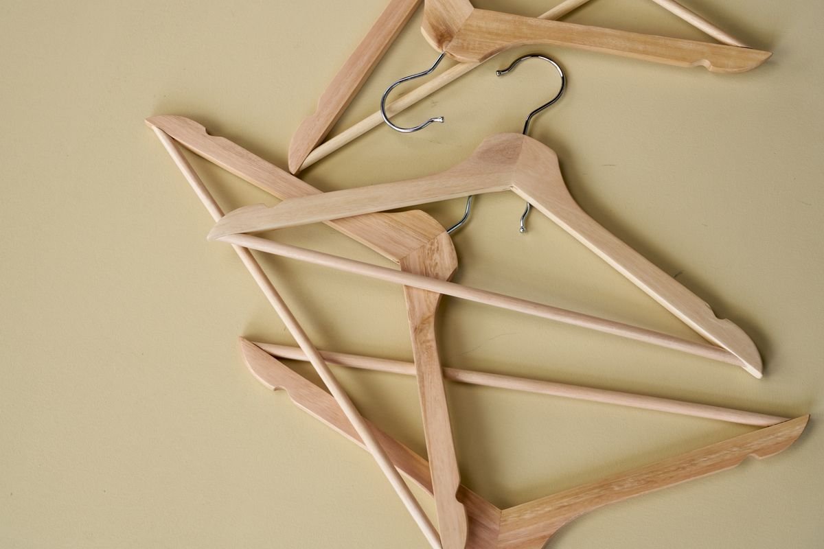 Wooden hanger flat lay