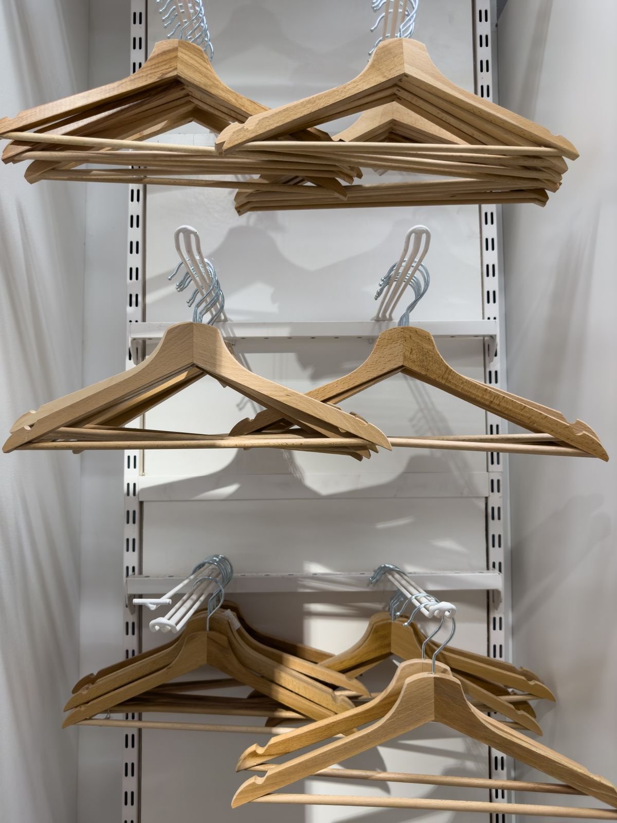 Wooden hangers stacked