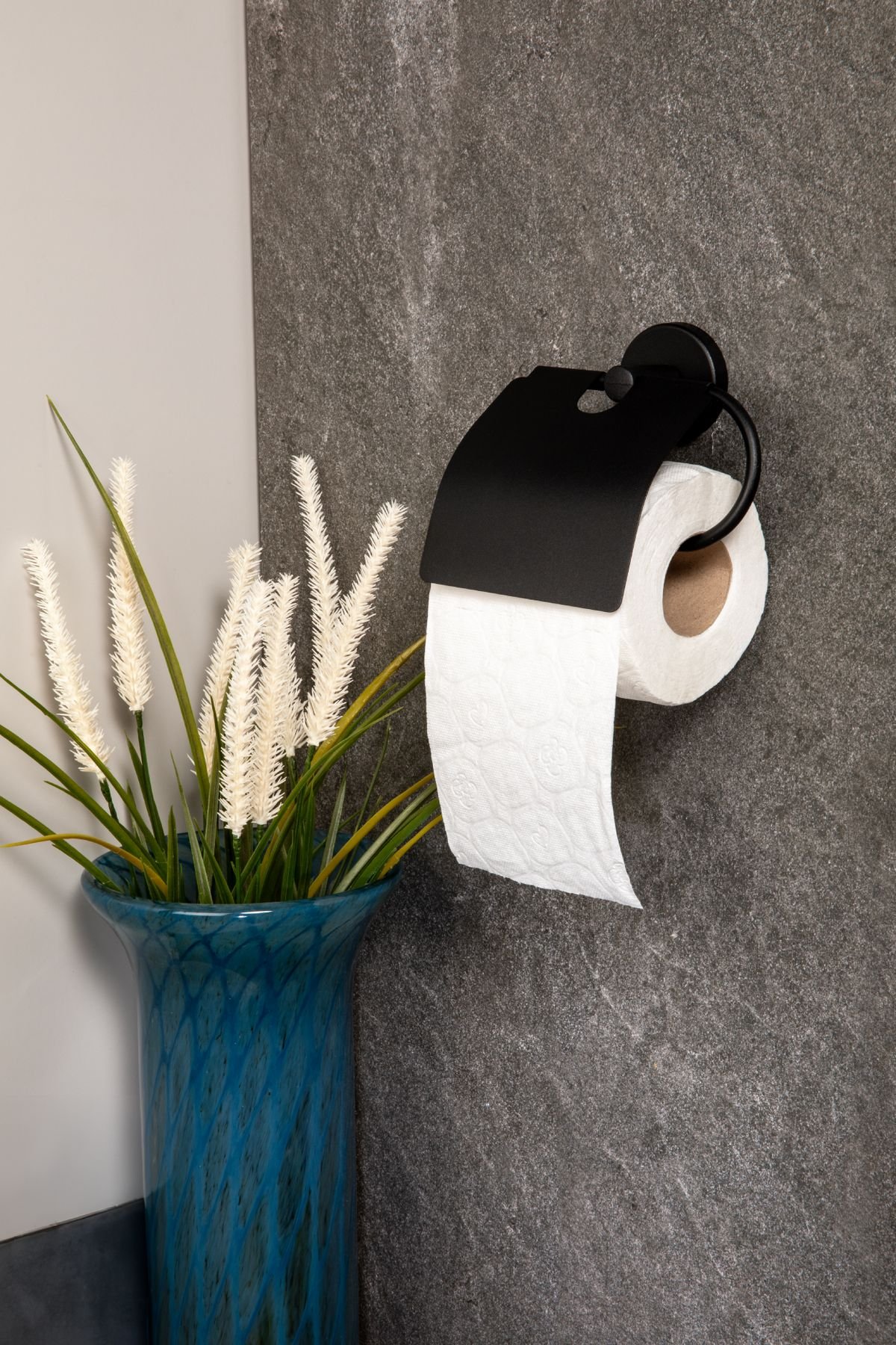 Toilet paper dispenser with decor
